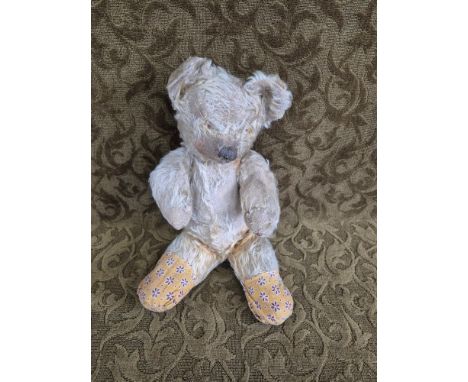 An early 20th century Teddy Bear for restoration.