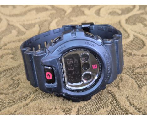 Casio G Shock Illuminator wristwatch.