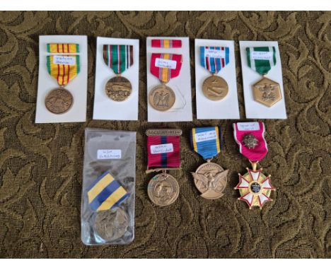 9 x Reproduction United States medals to include Vietnam Service medal, WWII Campaign, US Army Military Merit, Legion of Meri