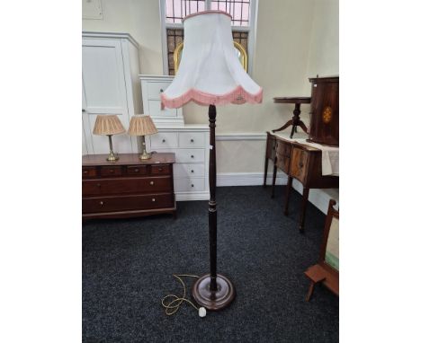 Polished beechwood fluted standard lamp.