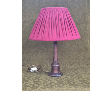 Turned polished beechwood table lamp.