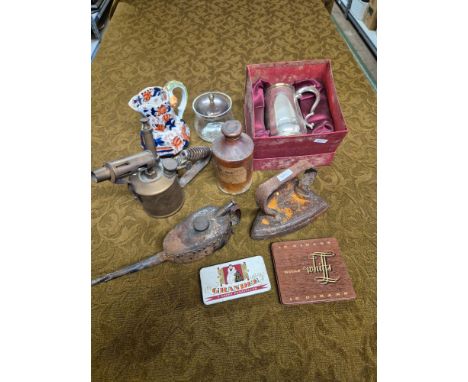 Mixed lot to include ink bottle, flat iron, vintage oil can, blow lamp, etc.