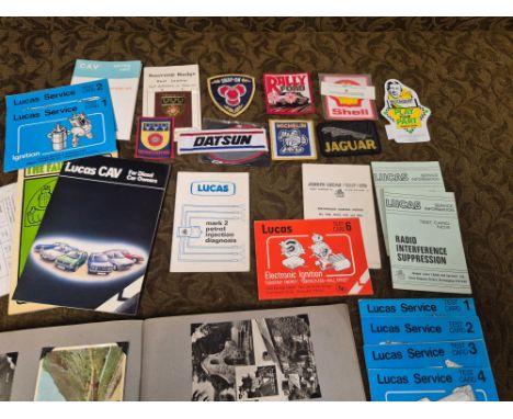 Vintage motoring patches, Lucas test cards and 2 scrapbook postcard albums.