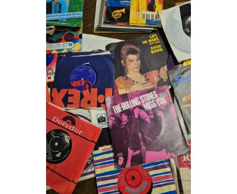 Large collection of 1950's, 60's, 70's & 80's 45rpm singles to include Elvis Presley, TRex, David Bowie, Barry Manilow, Cilla