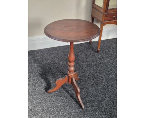 Victorian mahogany occasional table on turned column tripod base.