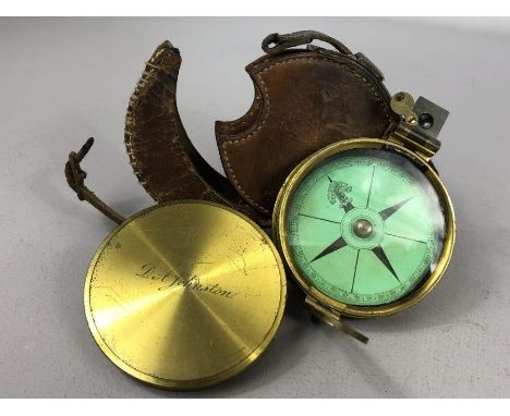 Brass compass in leather case, approx 7cm in diameter