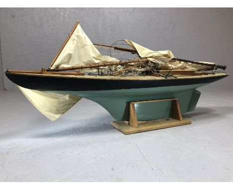 Wooden scale model of a yacht / sailing boat, approx 130cm in length, on cradled stand (A/F)