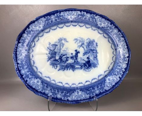 Royal Doulton ceramic blue and white meat plate of rounded rectangular form, decorated in underglaze blue with a scene of fig