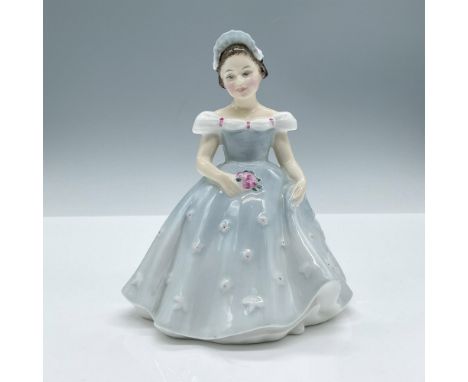 Glossy porcelain. Features a young girl in a light blue dress decorated with white flowers, holding a small bouquet of pink f