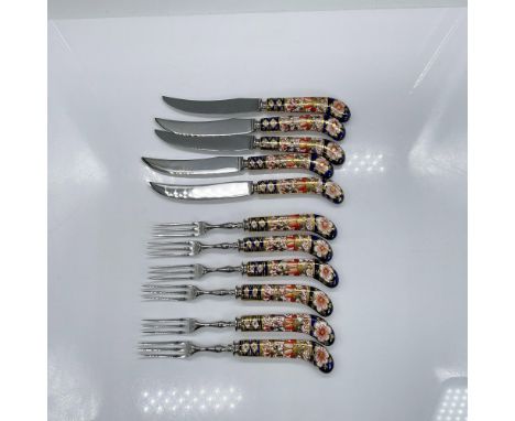 Vintage fruit forks and knives in a cobalt blue, red, and gold floral design. Six fruit forks each with three stainless steel