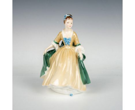 A beautiful figure of a woman in a light-yellow colored dress with a green cape. Royal Doulton backstamp. Artist: Peggy Davie