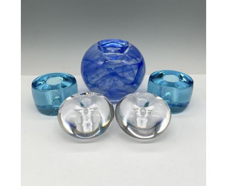 Colorful group of holders includes round swirled blue by Kosta Boda, pair of Hoya clear round candlestick holders and pair of