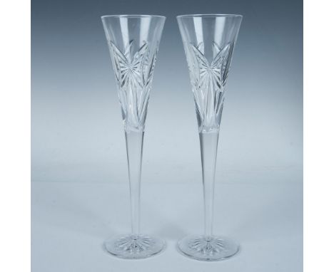 Pair of trumpet-shaped hand-cut and polished anniversary champagne toasting flutes featuring a bow motif. #139905. This item 