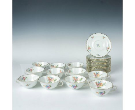 A lovely gilded set that features hand painted flower arrangements. Includes 11 cups and 13 saucers. Georges Boyer Limoges ba