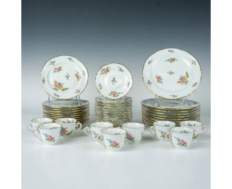 A lovely gilded set that features hand painted flower arrangements. Includes: 9 Coffee cups; 15 Saucers; 11 Snack or bread an