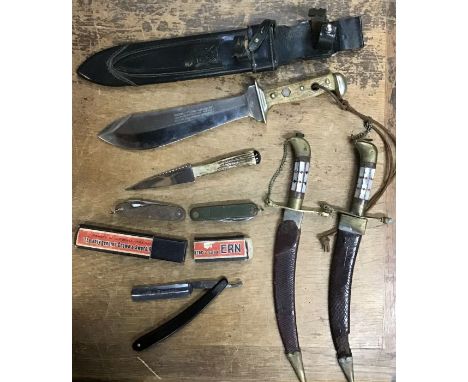 A 1960’s PUMA-WAIDBLATT No 3588 with original scabbard with two Dutch Army multi purpose pocket knife one KL and one KL70, a 