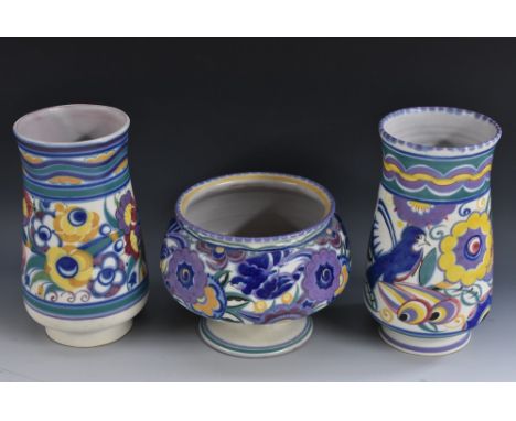 A Carter Stabler and Adams Blue Poole pedestal  vase, 15cm high, impressed mark;  a similar slender baluster vase, 22cm high,