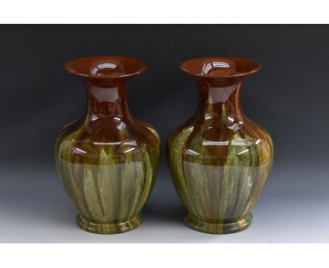 A pair of Torquay Pottery Linthorpe type baluster vases in the manner of Christopher Dresser, TC mark to base, 30.5cm high