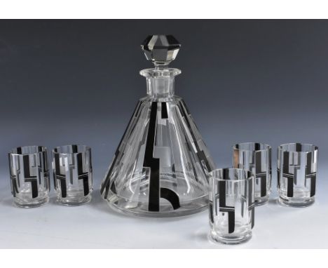 An Art Deco clear glass liqueur decanter, of conical from, applied in black enamels with geometric lines and engraved paralle