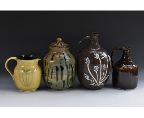 Studio Pottery - attributed to Janice Tchalenko, a stoneware ovoid jug with leaf motif, glazed in shades of ochre and green, 