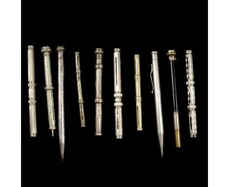 A white metal combination retractable pen and pencil, engine-turned design, white stone terminal, engraved initials, 10cm clo