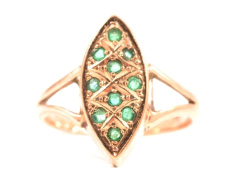 An emerald marquise cluster ring in 9 carat rose gold, the ten small emeralds pip claw and pave set in a 17mm cluster, 3mm wi