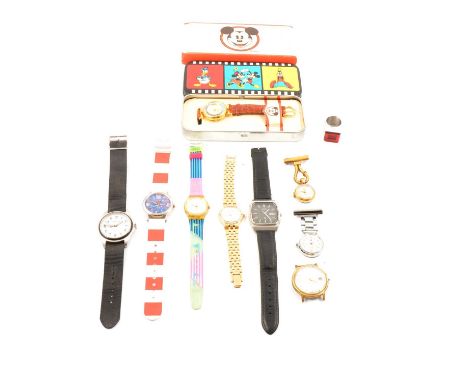 A collection of fashion and vintage watches, a Philippe Starck for Fossil red ring watch, ring size L; a Disney Minnie Mouse 