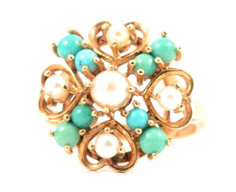 A turquoise and pearl dress ring, the central cultured pearl surrounded by four small pearls in heart motifs, divided by pair