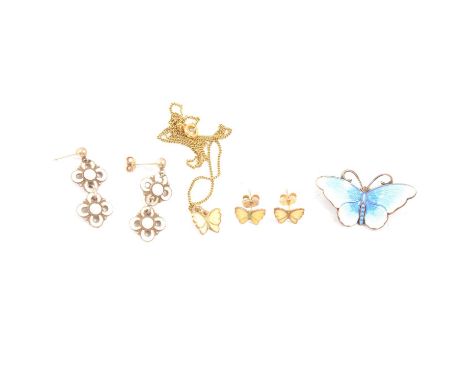 An Opro Norwegian silver and blue enamel butterfly brooch, 35mm wingspan; an Opro yellow enamel suite of earrings and pendant