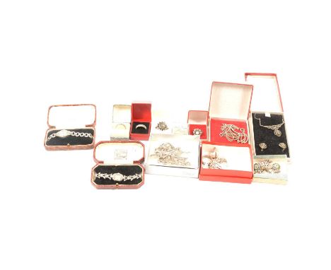 Two marcasite bands ring sizes I1/2 and N1/2; a marcasite and paste night and day ring size L; other marcasite rings; earring