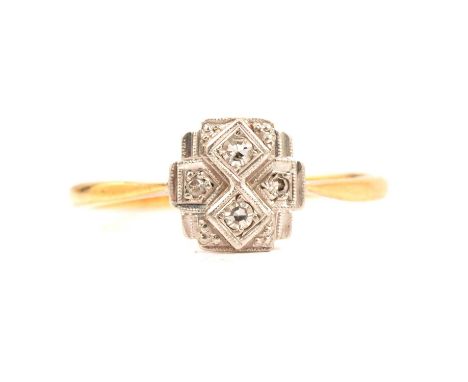 An Art Deco diamond cluster ring, four 8 cut diamonds pip claw set in a white metal 8.5mm wide rectangular head on a yellow m