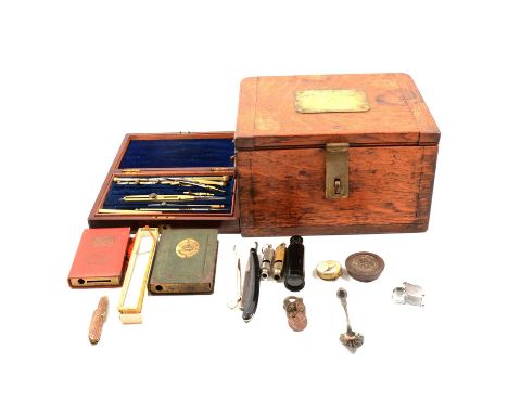 A oak twin handled box with clasp with two Post Office money boxes, compass, drawing set , Metropolitan Whistle; The Acme Sco