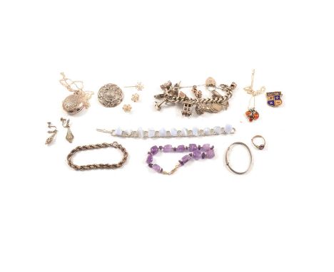 A collection of silver jewellery, a solid curb link charm bracelet with thirteen charms; twisted rope bracelet; 35mm Tudor Ro