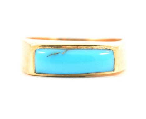 A turquoise dress ring, the rectangular arched cabochon cut stone, 15x4mm, set in a plain modern yellow metal mount ring size