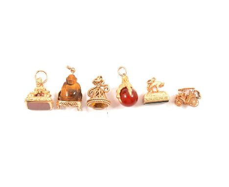 Five modern 9 carat gold seal type charms, bear on a plinth with bloodstone base, Birmingham 1967; tigers eye Buddha, London 