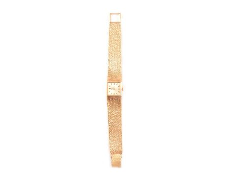 Certina - a lady's 9 carat yellow gold bracelet watch, 13mm square light cream baton dial in a 9 carat yellow gold case with 