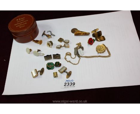 A stud box and contents including odd cuff links, polished stone, mother of pearl, white metal etc., some a/f.