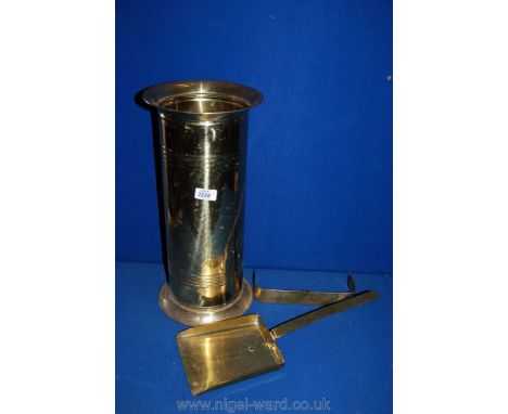 A cylindrical Brass stick stand, miniature Brass Fender and brass shovel