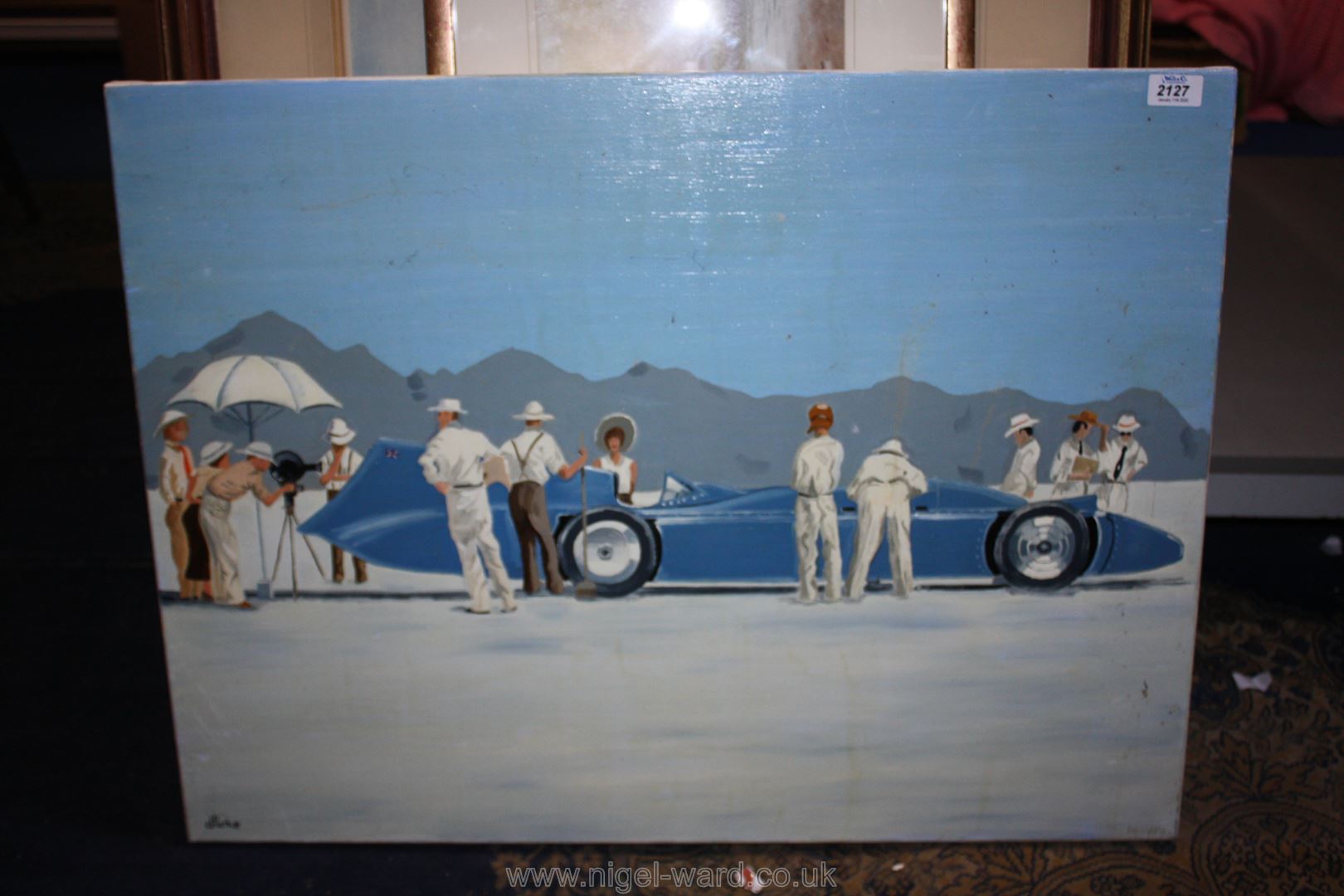 After Jack Vettriano, Oil on canvas of the Bluebird racing car at