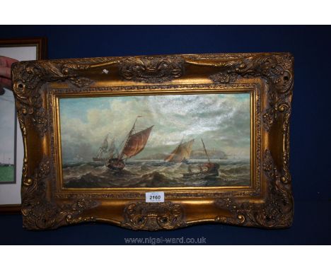 A Print on canvas of a seascape with old sailing ships in elaborate gilt frame, signed J.W. Carmichael (Jan 1800-May 1868, Br