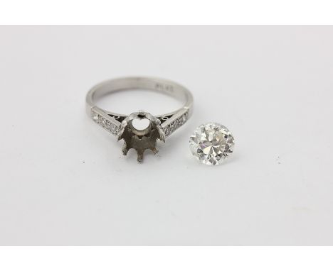 A diamond single stone ring, the round brilliant cut stone eight-claw set with three small stones to each shoulder, in platin