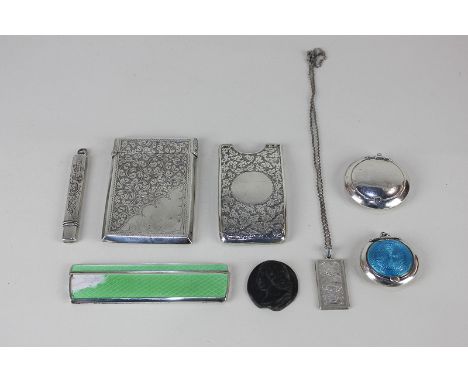 An Edward VII silver card case, maker William Aitken, Birmingham 1905, a silver circular vinaigrette, a silver cased pencil, 