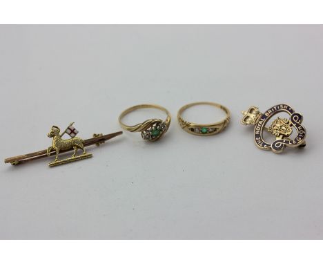 An emerald and diamond crossover ring, an emerald and diamond five-stone ring, a 14ct gold and enamel paschal lamb bar brooch