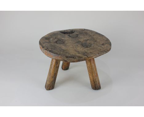 A 19th century burr walnut circular three-legged stool, 28cm diameter