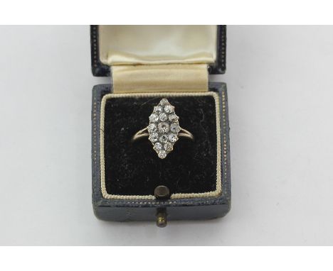 An old cut diamond ring, navette shaped with split shoulders