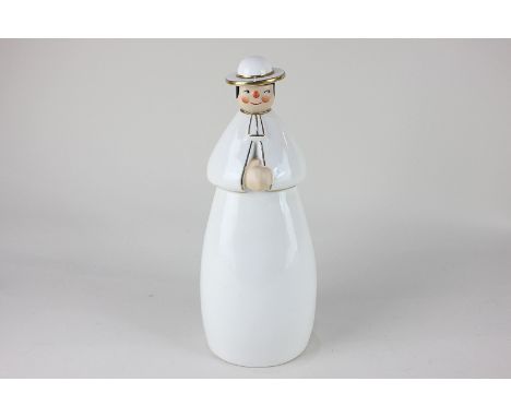 A Robj Paris figural flask in the form of a priest dressed in white robes, with gilt embellishments, 27.5cm