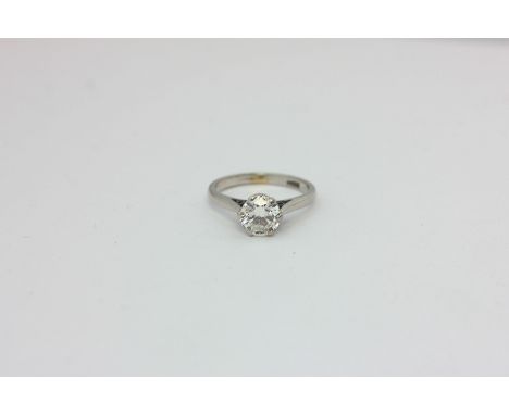 A diamond single stone ring, the round brilliant cut stone six-claw set in platinum