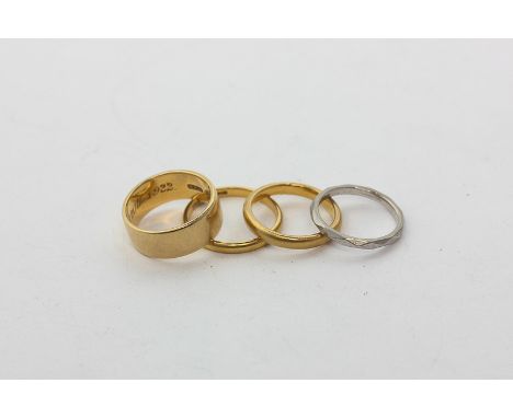 Two 22ct gold rings, 6.7g, an 18ct gold ring, 7.1g, and a platinum ring, 3g