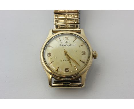 A gentleman's 9ct gold 'Imperial' wristwatch, manual movement, on gilt bracelet, Birmingham 1960