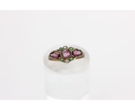 A pearl and amethyst 'suffragette' ring in 15ct gold, Birmingham 1925